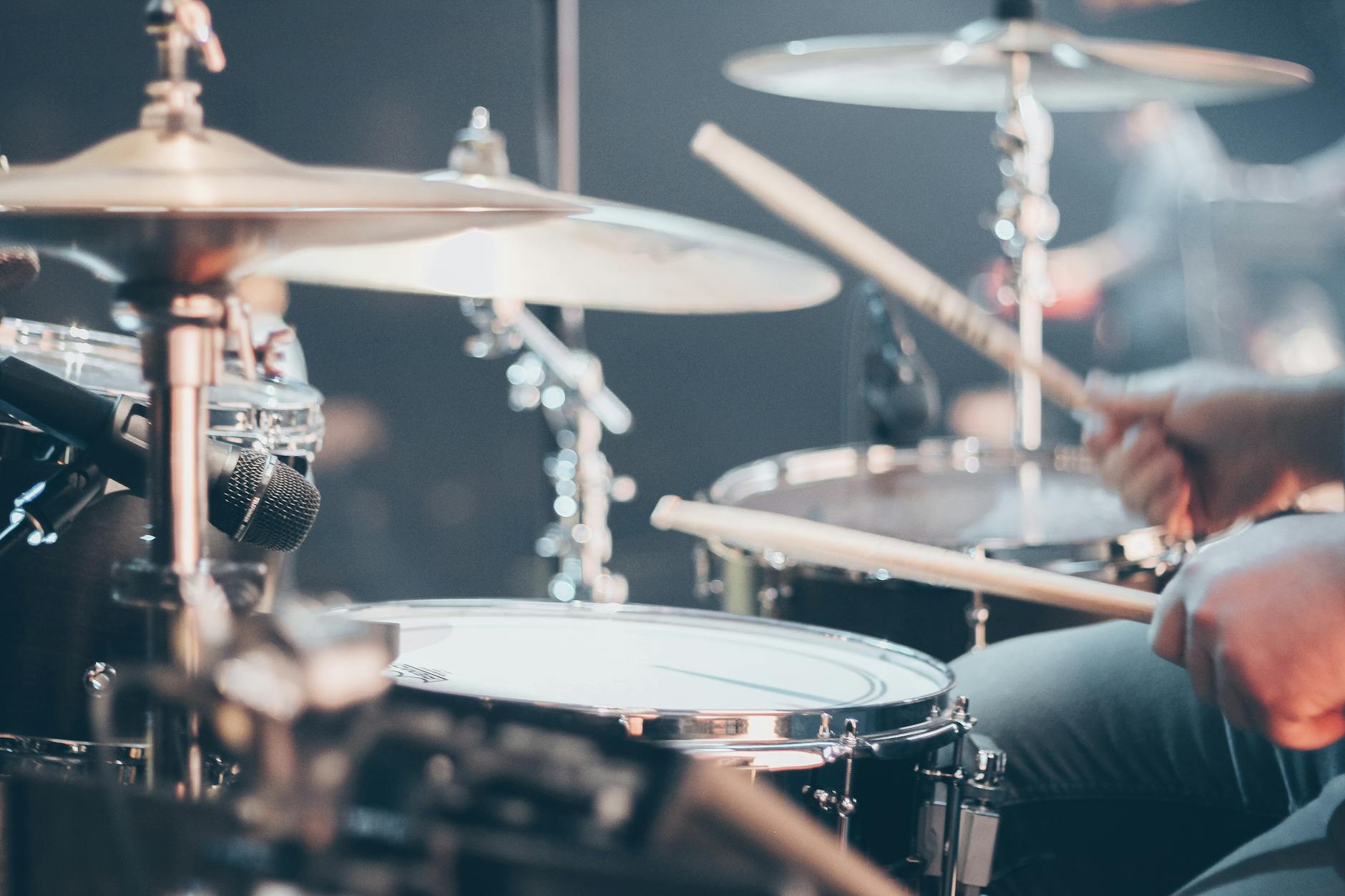 tilt shift photo of acoustic drum set